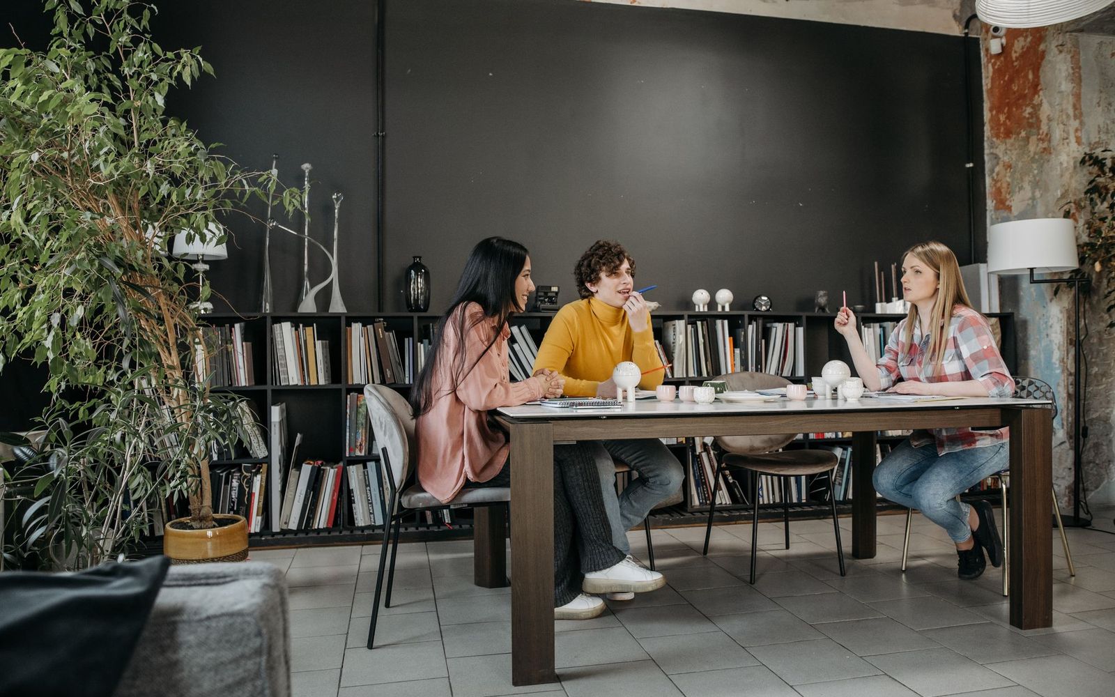 A laptop and coffee on a kitchen table