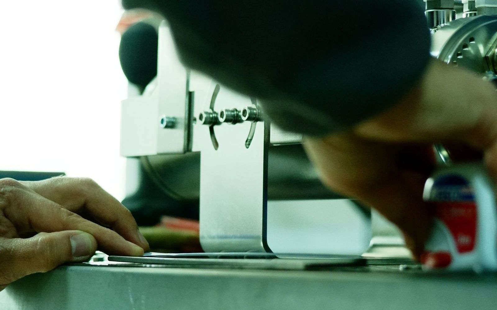 A business owner going through bank statements at a desk