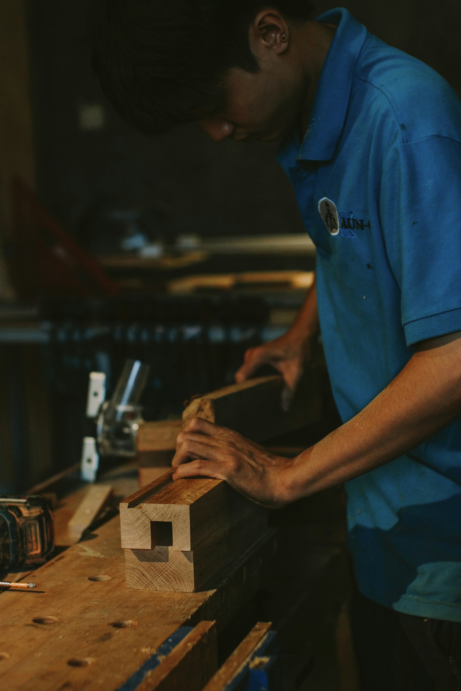 A carpenter working at a workbench