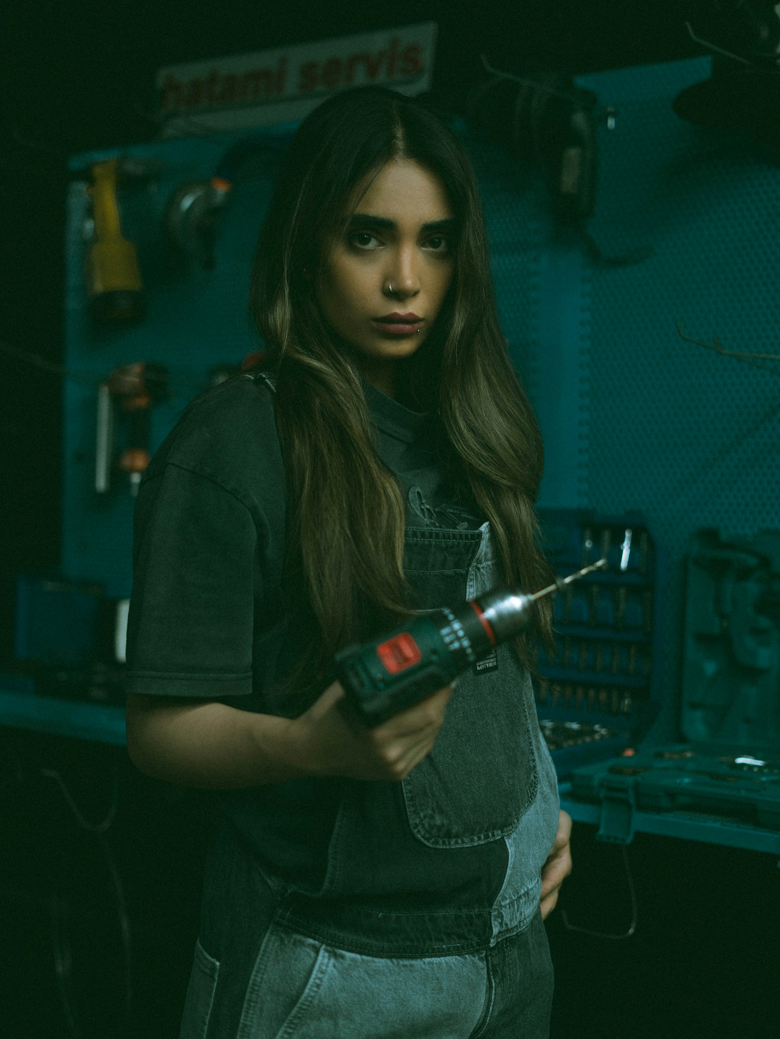 A business owner working late in a workshop